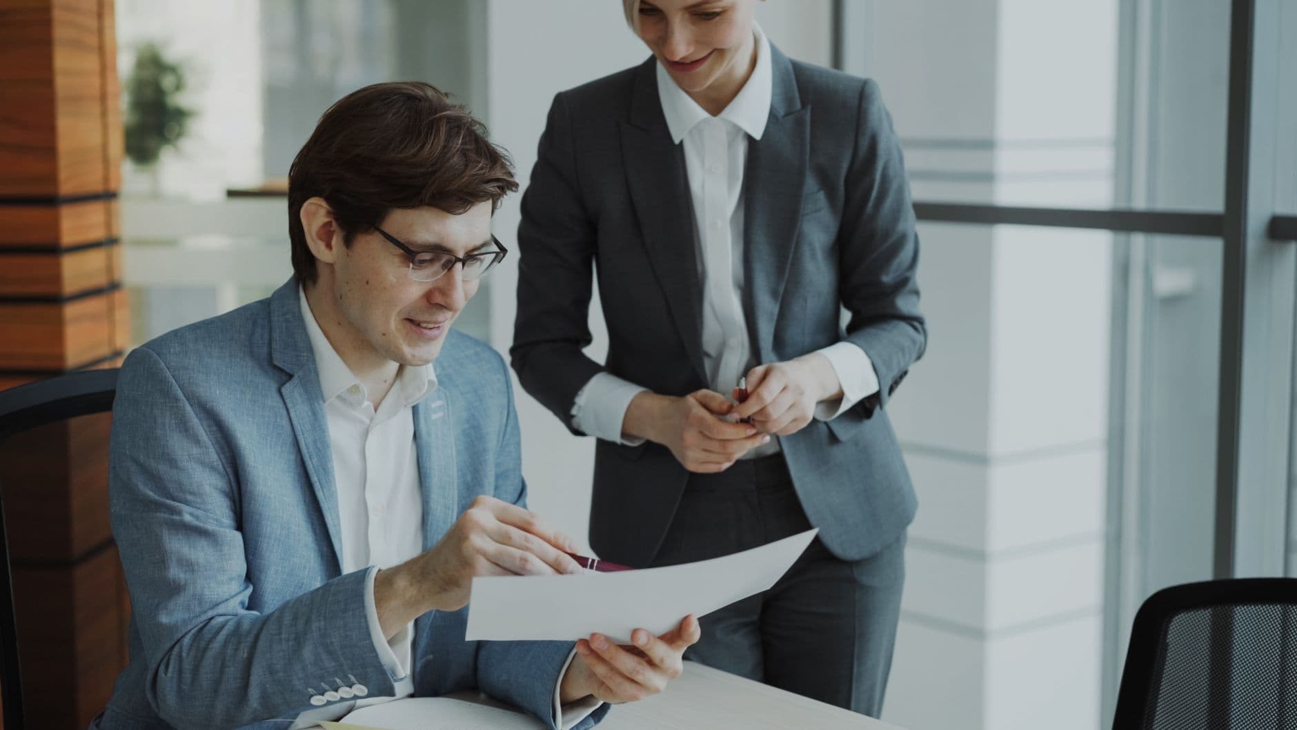 Business owner reviewing cash flow reports at a desk