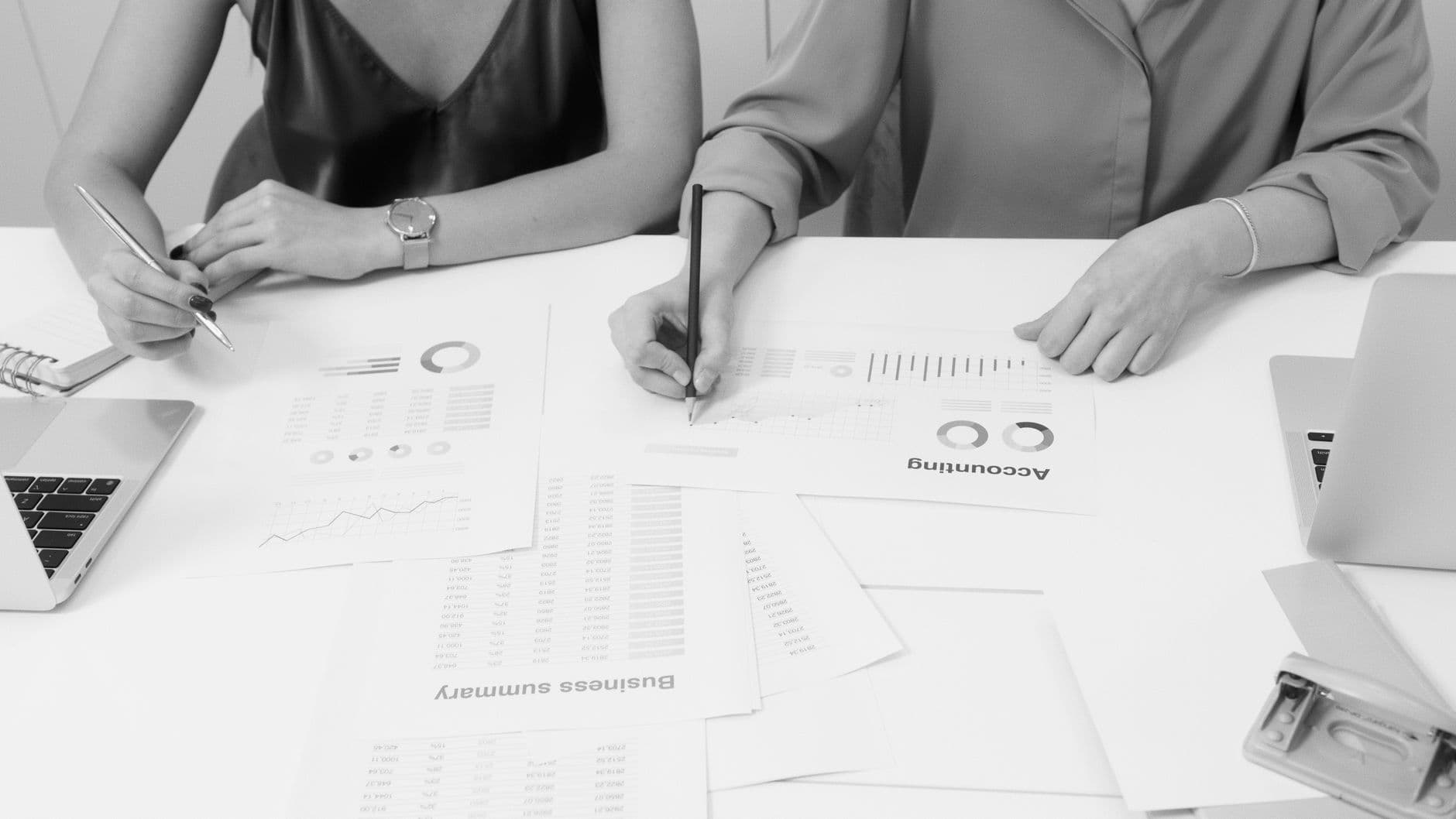 Farm couple reviewing personal tax documents with their CPA