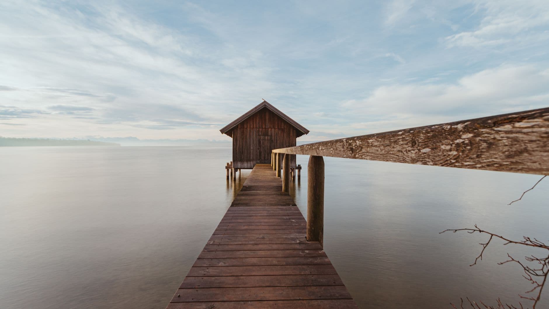 A lake cabin with a dock, representing a second home that could double as a rental property