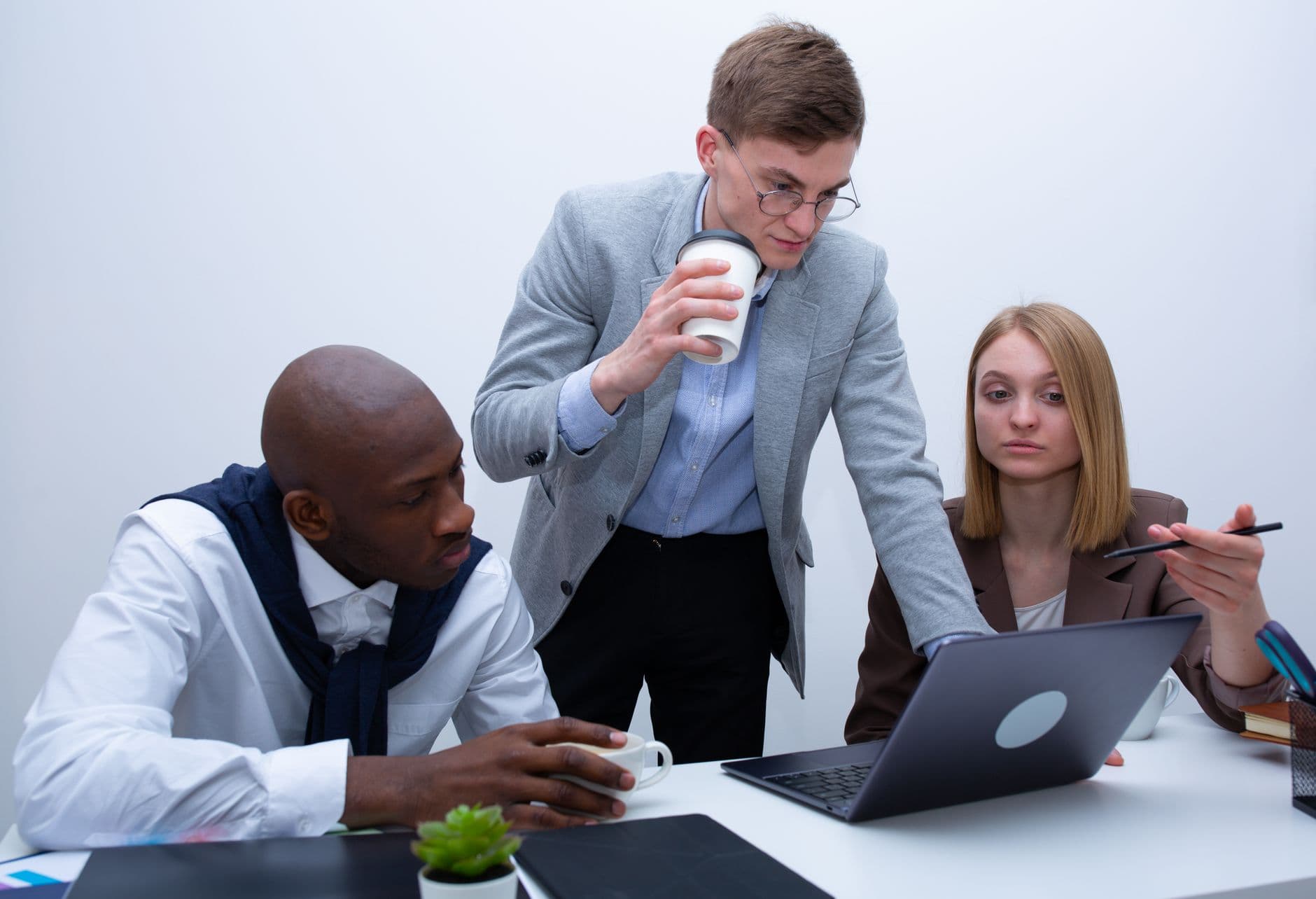 Accountant and farmer reviewing financial reports together at a desk