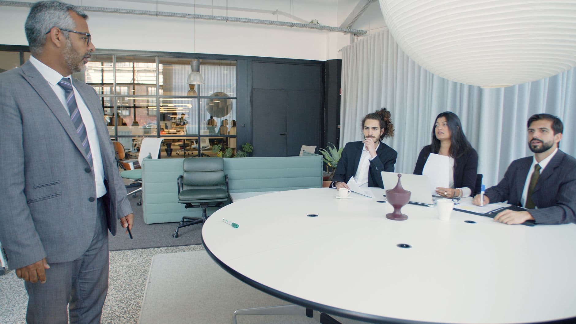 Service business owner meeting with an accountant over a laptop