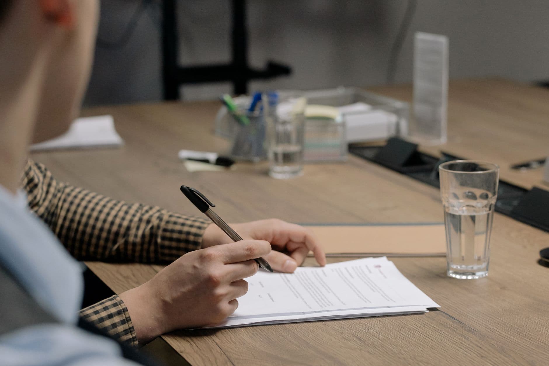 Business owner signing entity conversion documents with accountant