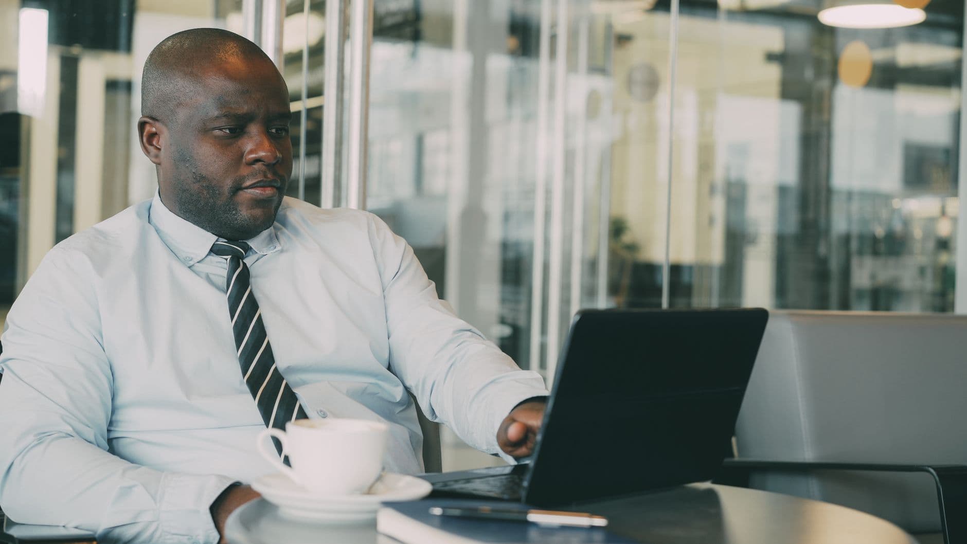 CPA and client discussing tax strategy documents during a mid-year meeting
